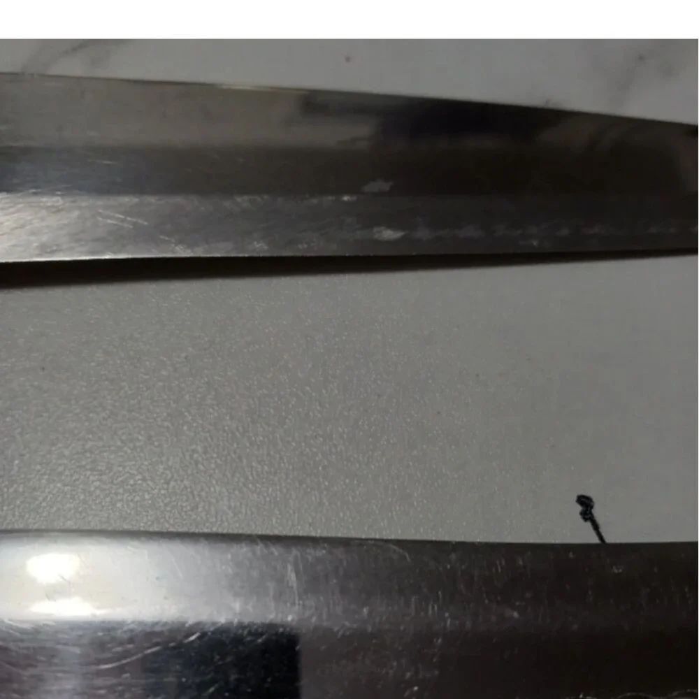 Pair of stainless steel Knives by Flint made in USA Surface scratches Partial